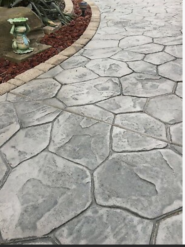 Random stone stamped concrete driveway