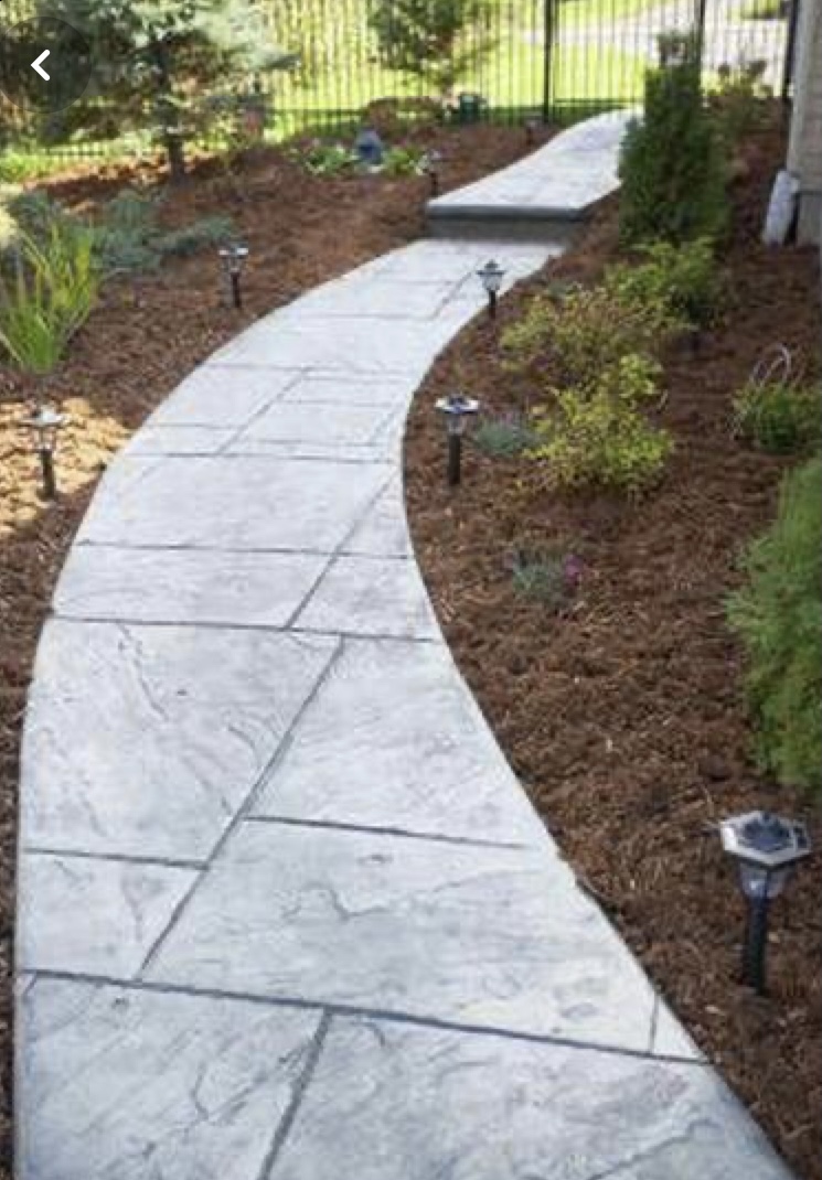 Curved stamped concrete garden path
