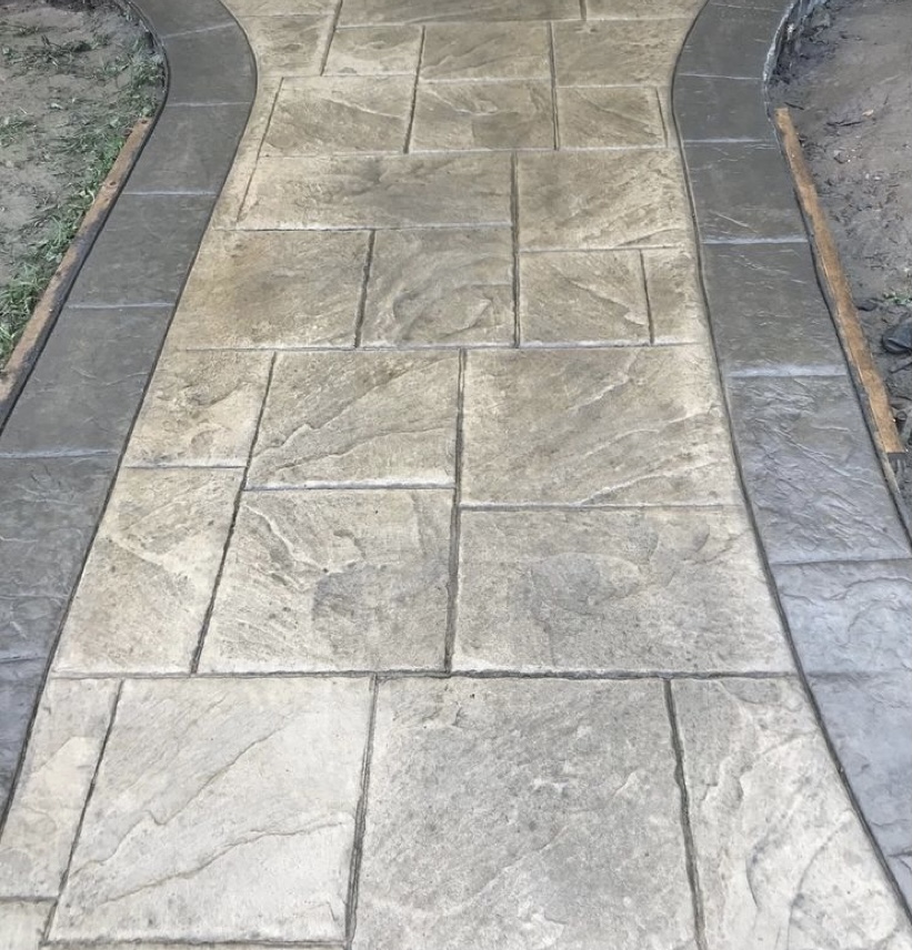 Stamped concrete walkway with contrasting border